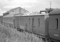 Ex-LMS coach converted to a 'dome car' for observation of pantograph/OHL.  Stored in the sidings at Thornton yard in the summer of 1987. [Ref query 7904]<br><br>[Bill Roberton 25/07/1987]