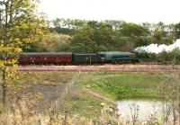 Already a distinctly autumnal look about the north end of Millerhill yard on 23 September as 60009 <I>Union of South Africa</I> brings up the rear of the empty stock of a steam special heading for Waverley. On the front of the train is 67026 <I>Diamond Jubilee</I>.<br><br>[John Furnevel 23/09/2015]