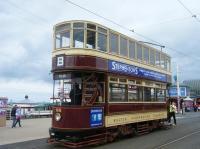 Bolton No.66, a regular on Heritage services in Blackpool, is seen with Blackpool North Pier in the background. The trolley pole isn’t normally reversed here – heritage services usually continue to Bispham.<br><br>[Veronica Clibbery 17/09/2015]