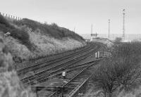 Looking north over the connection to Seafield Colliery sidings in November 1988.  The pit had closed in March of that year.  In the background is Seafield Colliery Frame, relegated from a signalbox in 1979 as part of the Edinburgh Resignalling.<br><br>[Bill Roberton /11/1988]