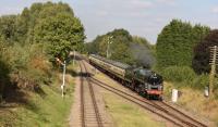 Green 9F 92214 approaching Quorn and Woodhouse station during the Great Central 2015 gala weekend on 2nd October. The 2-10-0 has been performing at various locations around the UK during 2015 [See image 50674]<br><br>[Peter Todd 02/10/2015]