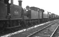 Locomotives awaiting disposal in the sidings at Bo'ness Harbour in February 1962. Nearest is NB N15 0-6-2T 69181, with sister locomotive 69131 standing beyond. Both had been withdrawn from Eastfield shed earlier that month. <br><br>[K A Gray 26/02/1962]