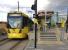 Metrolink Tram 3036 gets ready to return to Manchester from Rochdale on 18th July 2015. This new tram terminus is approximately at right angles to the station.<br><br>[Ken Strachan 18/07/2015]