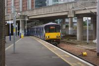 318258 arrives at Exhibition Centre with a westbound service on 02 August 2015.<br><br>[John McIntyre 02/08/2015]