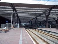 Rotterdam Centraal: The trainshed from the east end, 250 metres from end to end. Prior to redevelopment and eventual reopening in 2014, the platforms had individual canopies, although still entered from lower ground level. Now the overall roof extends across all platforms. <br><br>[Andrew Wilson 18/07/2015]