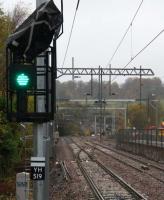 At the newly-installed-but not-yet-commissisioned junction with the Maryhill line, both photographer and route indicator had bags over their heads for different reasons on a very wet 10th November 2015. <br><br>[Colin McDonald 10/11/2015]