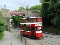 Former Leeds City Transport 60-seater 'Horsfield' tram no 180 of 1931 in action at Crich in June 2002.<br><br>[Ian Dinmore 22/06/2002]