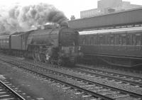 A Glasgow Queen Street - Kings Cross train takes the centre road through a wet and overcast Doncaster on 11 April 1963 behind A1 Pacific no 60150 <I>Willbrook</I>.<br><br>[K A Gray 11/04/1963]