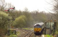 One of the DRS class 47 T&T operated services on its way back from Great Yarmouth to Norwich on 18 April 2013. The set is about to pass Brundall signal box, having run via the Berney Arms route.<br><br>[Ian Dinmore 18/04/2013]