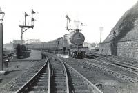Fowler 2P 4-4-0 40689 pulls away from Ardrossan Town station on 6 July 1959 at the head of a Winton Pier - Kilmarnock train. <br><br>[G H Robin collection by courtesy of the Mitchell Library, Glasgow 06/07/1959]