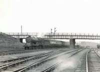 'Director' 4-4-0 62689 <I>Maid of Lorn</I> brings a train from Fife past Eastfield shed on 16 May 1954 on its way to Queen Street. [See image 39805]  <br><br>[G H Robin collection by courtesy of the Mitchell Library, Glasgow 16/05/1954]