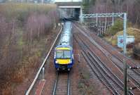 ScotRail 170475 takes the Borders line at Newcraighall North Junction on 19 January 2015 shortly after restarting from Newcraighall station with the 1054 Edinburgh Waverley - Tweedbank.<br><br>[John Furnevel 19/01/2015]