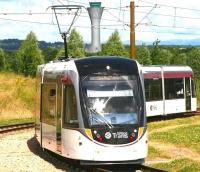 A city bound tram approaching Ingliston Park and Ride on 13 July 2014, shortly after commencing its journey from Edinburgh Airport.<br><br>[John Furnevel 13/07/2014]
