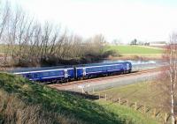 The 1128 ex-Tweedbank seen shortly after leaving Shawfair heading for Newcraighall on 15 February 2016. Photographed from the road bridge to the north of the station. <br><br>[John Furnevel 15/02/2016]