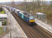 DRS 68001 <I>Evolution</I> takes the Grangemouth to Aberdeen intermodal service through Bridge of Allan on 27th February 2016.<br><br>[Bill Roberton 27/02/2016]