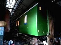 Down in the carriage shed, something stirred - the mystery being, why would the GC have a Southern Region coach? [See image 12077] - the answer, apparently, being that this is a DMU coach, and the Southern green is an undercoat for a dark green final coat.<br><br>[Ken Strachan 27/02/2016]