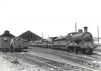 A lineup of ex-Caledonian 3F 0-6-0s on shed at Ayr in the summer of 1959. The locomotives are 57596 (nearest), 57644, 57611, 57580 and 57633.      <br><br>[G H Robin collection by courtesy of the Mitchell Library, Glasgow 04/07/1959]