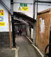 This rather unusual exit from the platform underpass at Temple Meads was used to guide enthusiasts from the station to the waiting shuttle buses for the St Philip's Marsh open day. For the usual standard of passage [see image 42033] [Ref query 44498].<br><br>[Ken Strachan 02/05/2016]