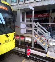 One up on swinging barriers [see image 48313]. All trams entering or leaving the Piccadilly Gardens area currently have to stop (see the rail level stop board) and receive authorization to proceed from a person in a cabin.<br><br>[Ken Strachan 16/04/2016]