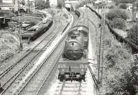 V1 67631 approaching Knightswood South Junction with a Helensburgh - Bridgeton train on 1 August 1957. Turning off to the west is the freight only Cowdenhill Branch, which served various industrial locations in the area. <br><br>[G H Robin collection by courtesy of the Mitchell Library, Glasgow 01/08/1957]
