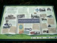 A display board sited near the former Hazelhead Bridge station detailing the Trans Pennine Trail now running along the trackbed of the Manchester to Sheffield and Wath 1500V DC electrified line. The board also describes the history of the line and the various owning railway companies during its operational period.<br><br>[David Pesterfield 01/06/2016]