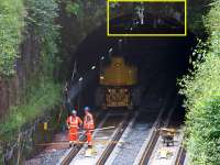 Installation of signalling equipment at the north portal of the Queen Street High Level Tunnel on 21st July 2016. Just visible in the highlighted area is the tunnel's OHLE conductor bar recently installed as part of the EGIP electrification work. <br><br>[Colin McDonald 21/07/2016]