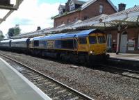 A rail movement, hauled by 66744, from Tyne coal terminal to Hunterston passing through Dumfries on 27th July 2016. <br><br>[Brian Smith 27/07/2016]