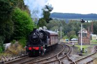 Ivatt Class 2 No.46512 departs Boat of Garten with the last train of the day to Aviemore. The engine is hauling six coaches instead of the usual five.<br>
<br>
<br><br>[John Gray 23/08/2016]