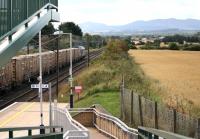 Looking west along the ECML towards Edinburgh from the station footbridge at Wallyford on 7 September 2016. The passing train is the 1326 Oxwellmains – Powderhall empty 'Binliner', hauled by 67009.   <br><br>[John Furnevel 07/09/2016]