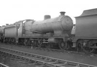 Robinson O4 2-8-0 63870 photographed in the shed yard at Mexborough in the 1960s.<br><br>[K A Gray //]