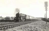 Black 5 45160 photographed just north of Falkland Junction on 6 August 1955 with an Ayr - Edinburgh Princes Street train.<br><br>[G H Robin collection by courtesy of the Mitchell Library, Glasgow 06/08/1955]