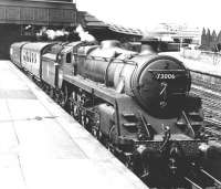 BR Standard class 5 4-6-0 73006 stands with a train at the south end of Perth station, thought to be in the 1950s. The locomotive had arrived at Perth shed new from Derby Works in June 1951 and remained here until January 1963. <br><br>[Dougie Squance (Courtesy Bruce McCartney) //]