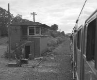 View from the Branch Line Society's Lothian & Fife Wanderer on 23 August 1980 of the closed Oakley signalbox, replaced by a ground frame.<br><br>[Bill Roberton 23/08/1980]