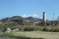 The central sugar factory at Basseterre which was in operation between 1912 and 2005. The St Kitts Railway made a thirty mile circuit of the island and operated seasonally to bring harvested cane from the various estates to this central processing plant. Before the 21st century tourist trains sugar cane was the sole traffic on the line.