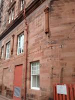 Some of the evidence that the back of the Caledonian Hotel was once more than a car park. The corbels would have supported the roof arches and other marks indicate that there were structures attached to the wall.<br><br>[David Panton 17/03/2017]