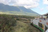 The St Kitts Scenic Railway train running north alongside the range of volcanic mountains that overlook the Atlantic Coast. <br><br>[Mark Bartlett 18/02/2017]