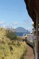 Rounding the northern tip of St. Kitts the Dutch island of Sint Eustasius comes into view from a train heading for La Vallee.<br><br>[Mark Bartlett 18/02/2017]