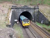 Into the Totley Tunnel goes a 142 Pacer, just east of Grindleford.<br><br>[Bruce McCartney 01/04/2017]