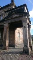 One of the the southern, harbourside, of the two pedimented porches of the original Burntisland station building of 1847.<br><br>[Alan Cormack 20/04/2017]