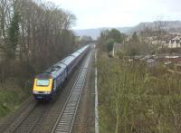 The 15.23 to Paddington (time from Bath Spa) is about to pass Oldfield park at speed. Photo' taken from road bridge adjacent to the S&D trackbed. [See image 58426]<br><br>[Ken Strachan 05/03/2017]