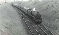 Black 5 45151 with a returning excursion from Ayr Races heading for Glasgow, photographed near Kilbarchan on 27 September 1959. [Ref query 1008]   <br><br>[G H Robin collection by courtesy of the Mitchell Library, Glasgow 27/09/1959]