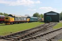 Preserved diesels 37152 and 46035 stand in the Peak Railway sidings at Rowsley alongside the Heritage Shunters Trust stock shed. The Trust has examples of Classes 01, 02, 03, 04, 05, 06, 07, 08, 09 and 14 at Rowsley - a remarkable collection that is well worth a visit, if a little difficult to photograph in cramped surroundings but at least most are now under cover.<br><br>[Mark Bartlett 07/05/2017]