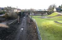 Looking west towards the site of the original Alloa station junction in January 2006, with the trackbed of the former Devon Valley route turning off to the right.<br><br>[John Furnevel 03/01/2006]