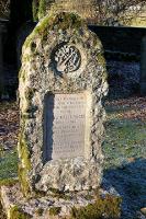 The memorial stone to the 30+ workers killed during the construction of Talla reservoir showing the <i>crossed pick & shovel</i>. Tweedsmuir churchyard 2005. For the full inscription [see image 6066].<br><br>[John Furnevel 30/11/2005]