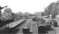 View west over Alloa station in June 1963. A DMU waits at the platform while Dunfermline shed's J36 0-6-0 no 65338 stands in the sidings to the north.<br><br>[John Robin 07/06/1963]