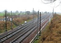 View south at Quintinshill in February 2006, showing the PW compound and access point on the east side of the line.<br><br>[John Furnevel 09/02/2006]