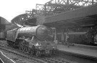 Platform scene at the east end of Newcastle Central in the summer of 1962. In the foreground is Gresley A3 Pacific no 60111 <I>Enterprise</I>, while in the background a Tyneside DC electric unit is preparing to depart for South Shields.<br><br>[K A Gray 23/06/1962]