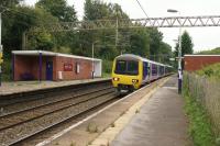 A Northern Class 323 arrives at Styal with a train from Manchester Piccadilly to Alderley Edge via Manchester Airport on the morning of 03 September 2017.<br><br>[John McIntyre 03/09/2017]