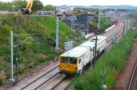 SB Rail tamper DR 73803 restarts northbound out of Millerhill Yard following a signal check on 24 September 2017. The unit had been engaged in preparatory work on the new ScotRail stabling sidings. <br><br>[John Furnevel 24/09/2017]