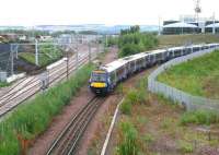 ScotRail 170461 approaching the Newcraighall stop on Sunday 24 September 2017 with the 0845 Tweedbank - Edinburgh. Work on the new EGIP electric train depot continues in the left background - as it does on the new Edinburgh and Midlothian Recycling and Energy Recovery Centre in the right background<br><br>[John Furnevel 24/09/2017]